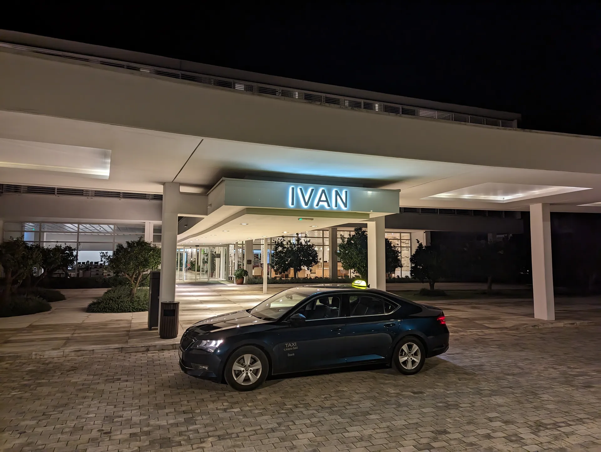 TAXI Antonio Škoda Superb waiting for a guest pickup at the Amadria Park resort in Šibenik at night