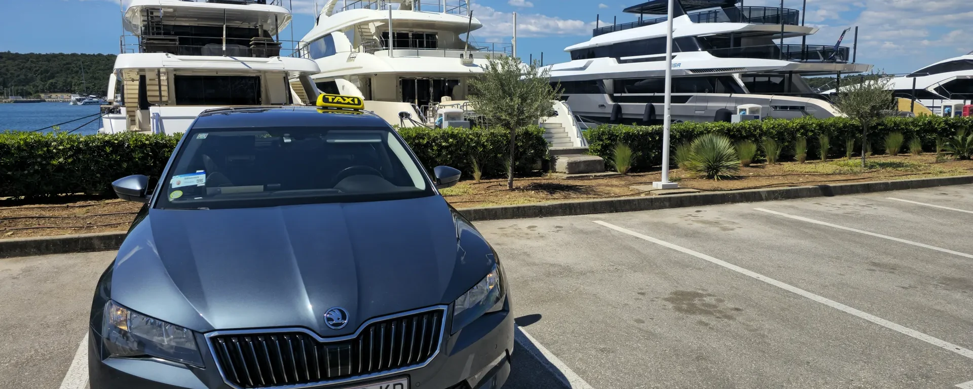 Taxi Šibenik driver Antonio Šakić at the wheel of his Škoda Superb