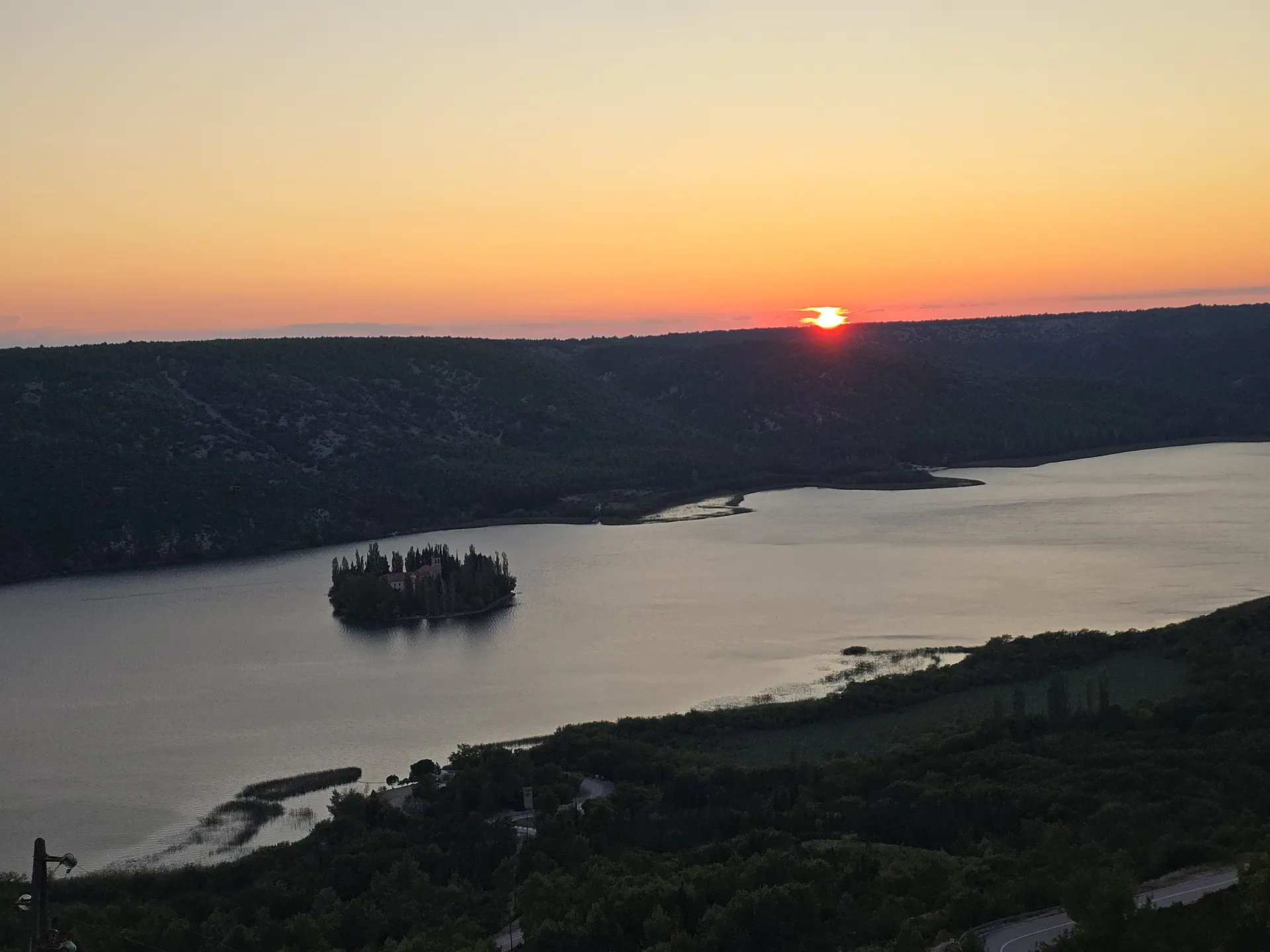 Visovac island monastery at sunset in Krka National Park
